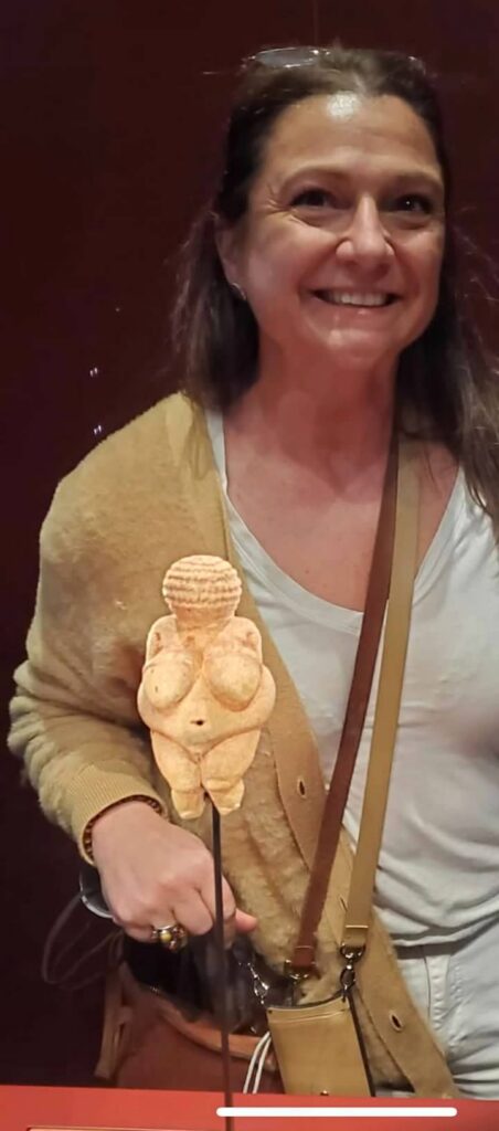 Rachel, European travel designer, with the Venus of Willendorf at Vienna’s Naturhistorisches Museum