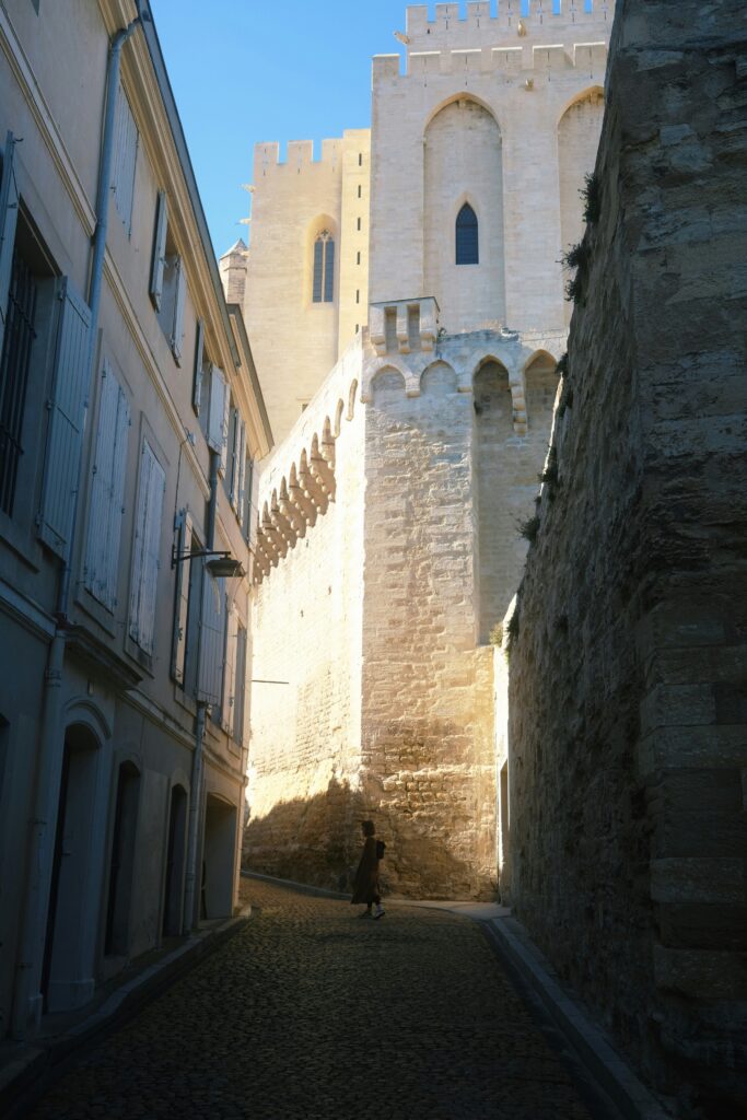 Quiet morning street in a European old town near a river cruise dock